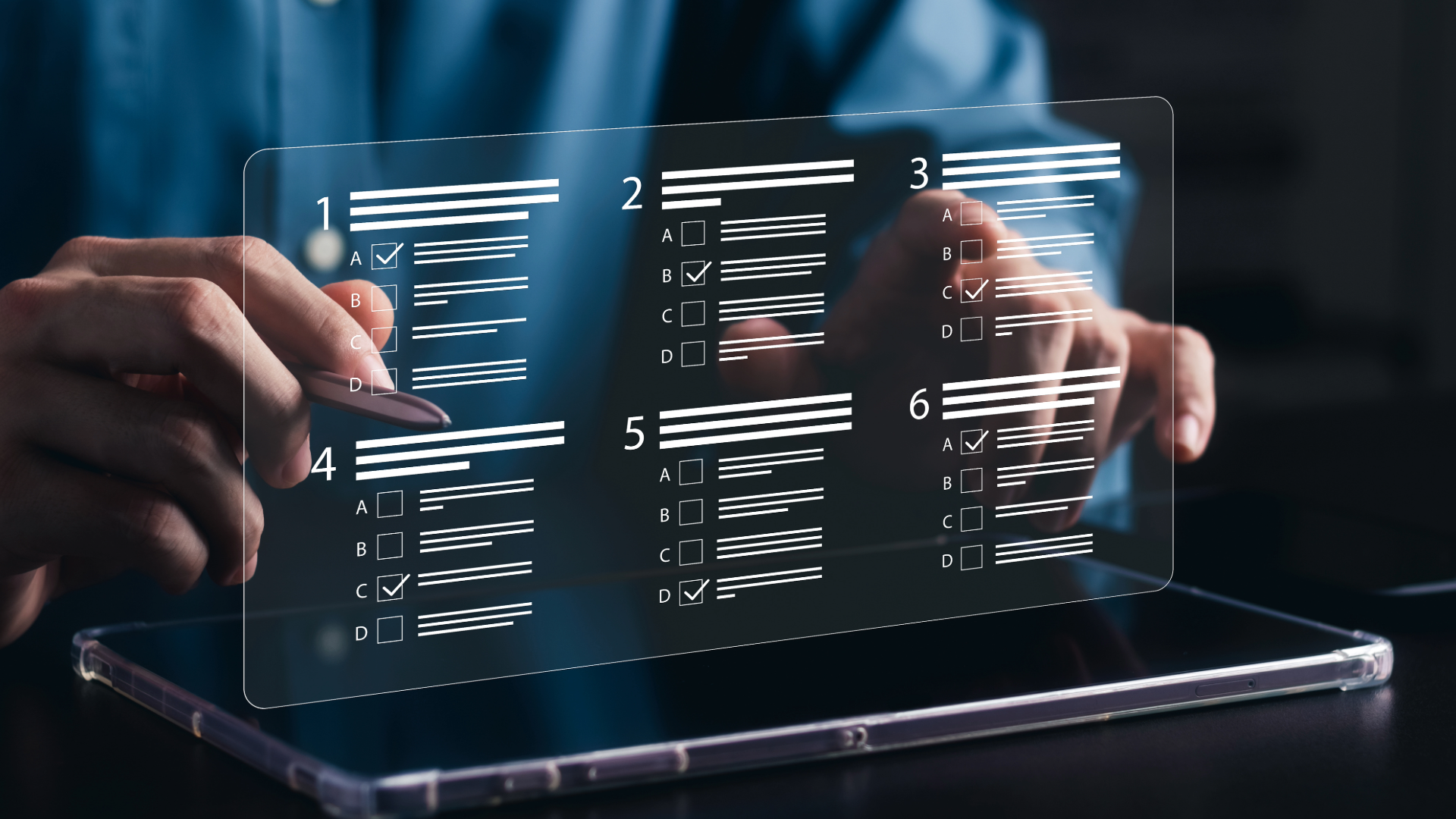 hands at a computer tablet and display screen showing checklists